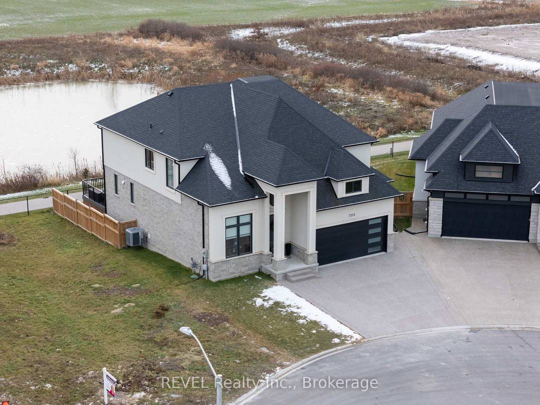 Luxury, style, and modern convenience define this stunning 2 storey stone amp ; stucco home, built in 2022 and backing onto a tranquil retention pond.