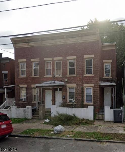 This 4 family property offers great potential, featuring four separate units, each with three bedrooms, one full bathroom, a kitchen, and a living room.