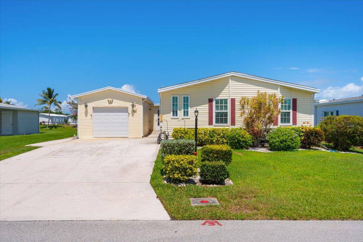LAND OWNED ON THE WATER. OVERSIZED GARAGE.