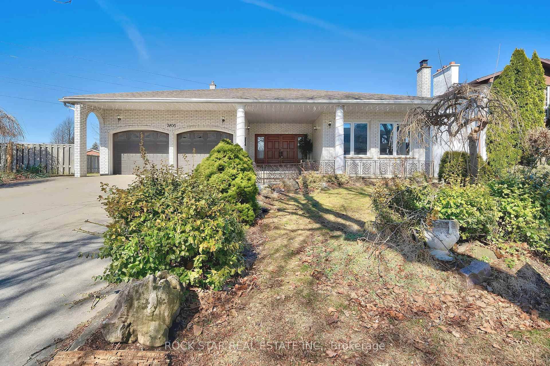 A stately amp ; spacious residence nestled in a well established neighbourhood with tree lined streets.