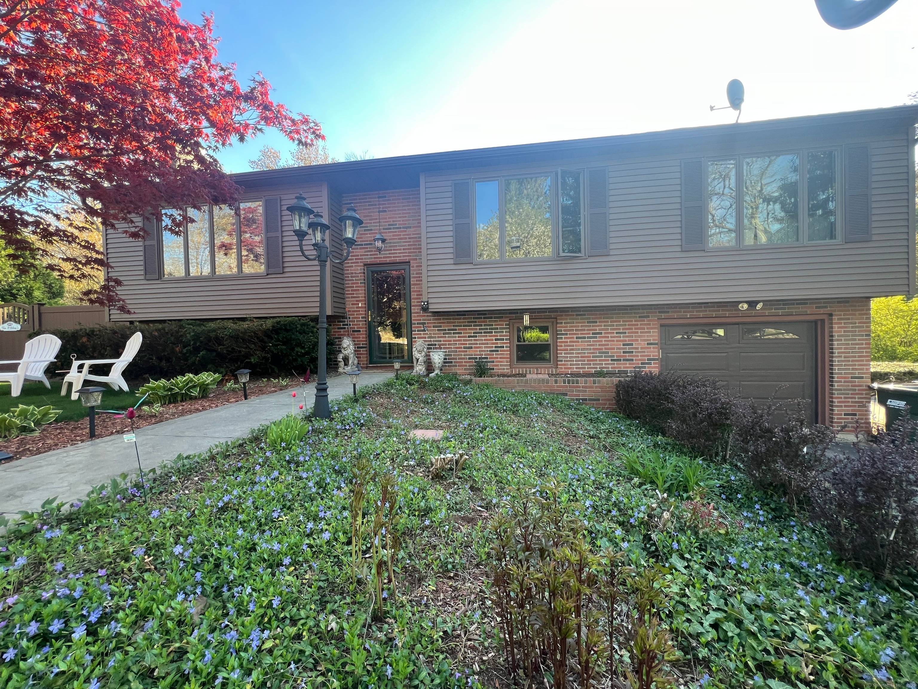Charming Raised Ranch Just Steps from Oxoboxo Lake Welcome to this lovingly maintained 3 bedroom, 1.