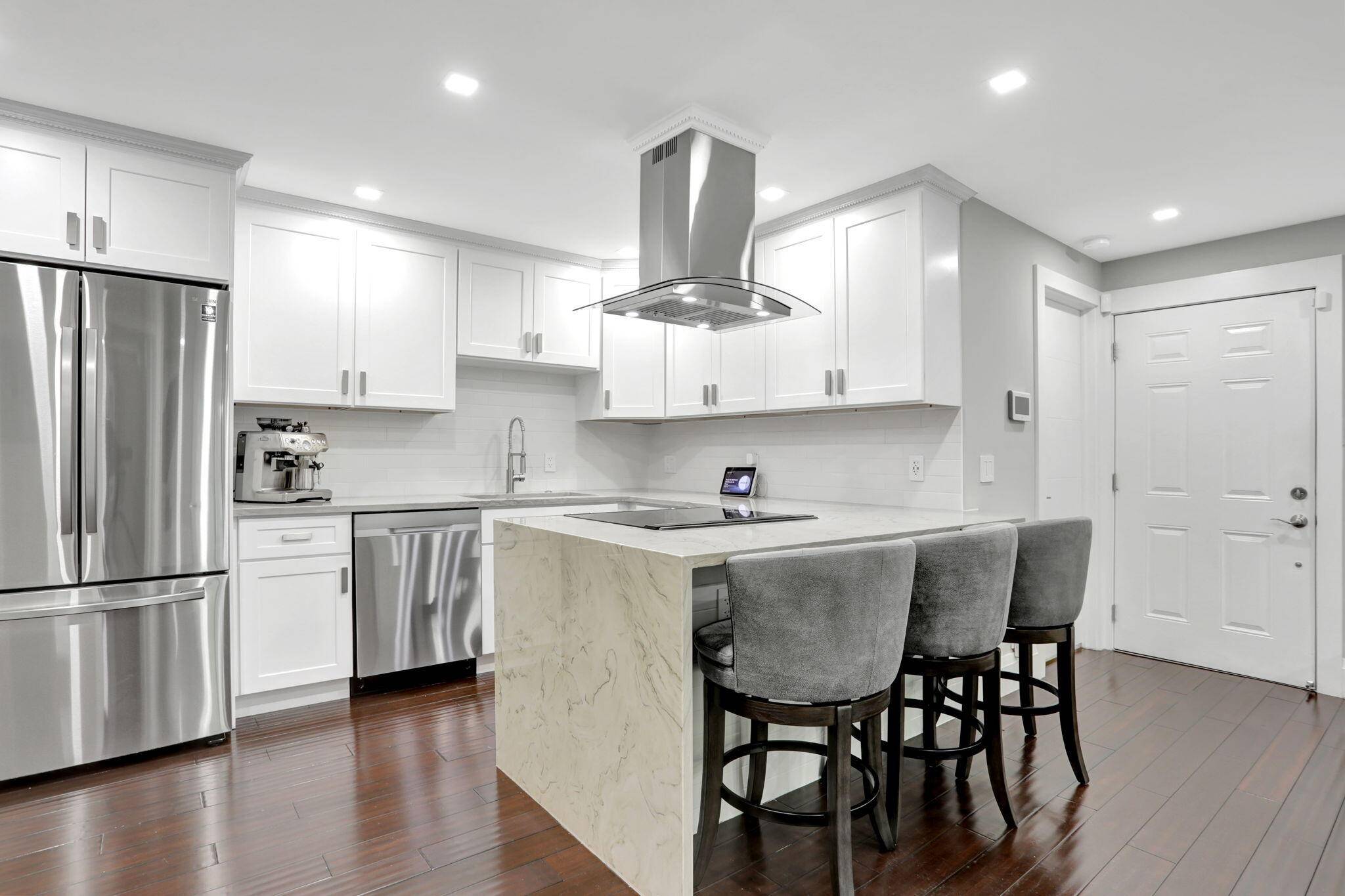 Discover elevated living in the heart of Deerfield Beach with this beautifully updated, sun drenched, south facing corner condo.