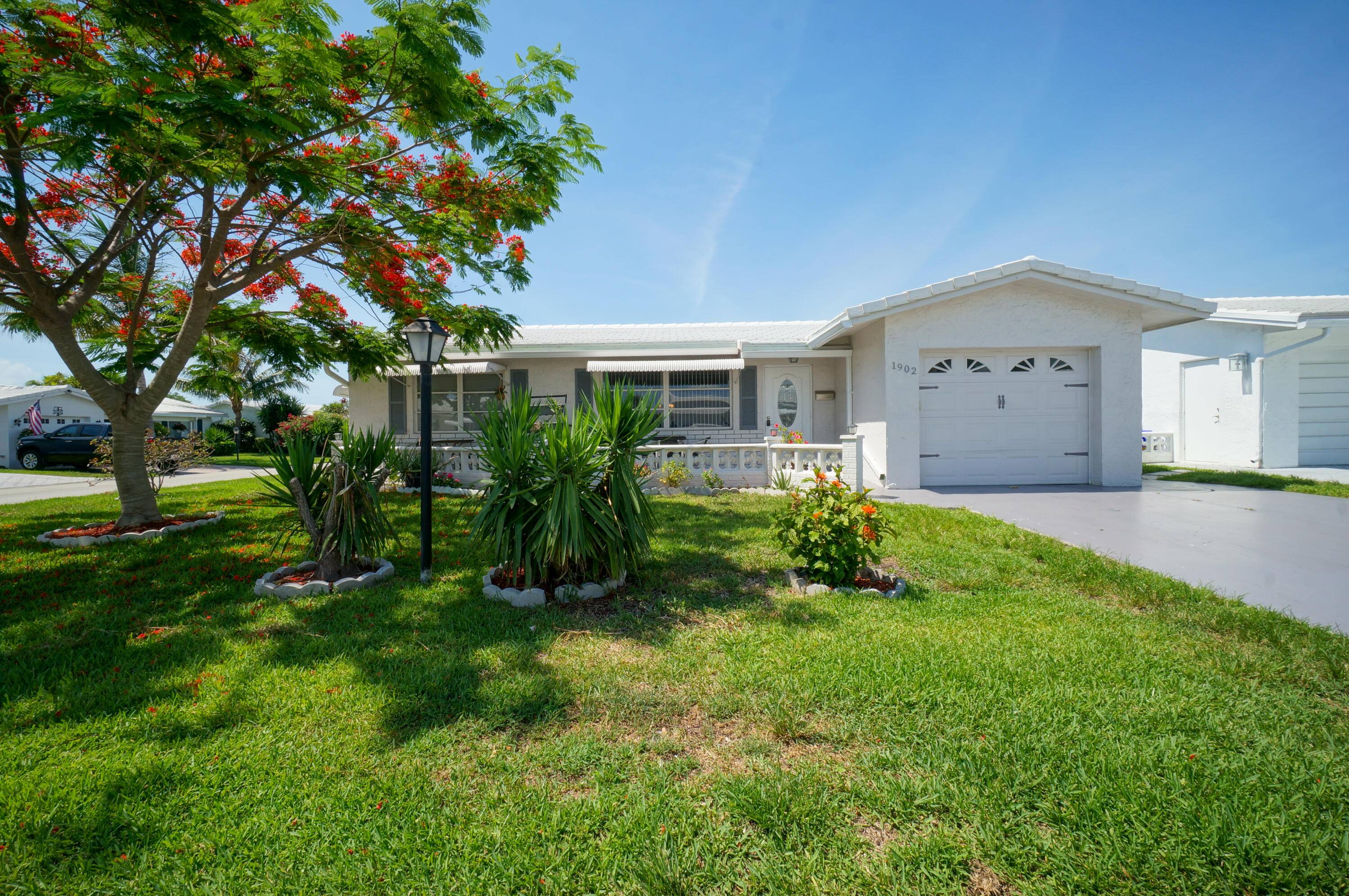 Welcome to this inviting Edgewood model single family home, perfectly situated on a prime corner lot in the heart of Boynton Beach.