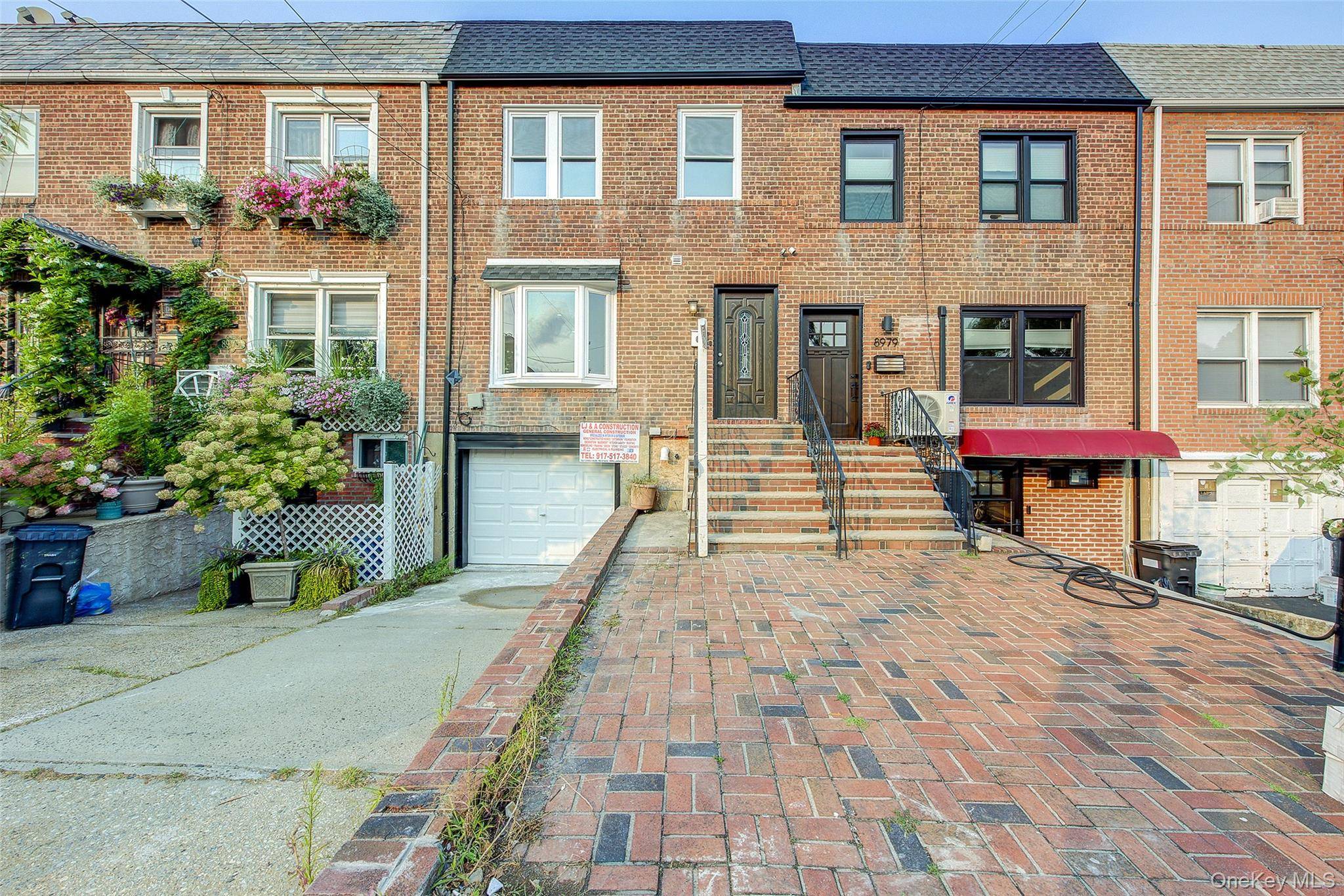 Don't miss this exceptional, fully renovated brick home in Jamaica !