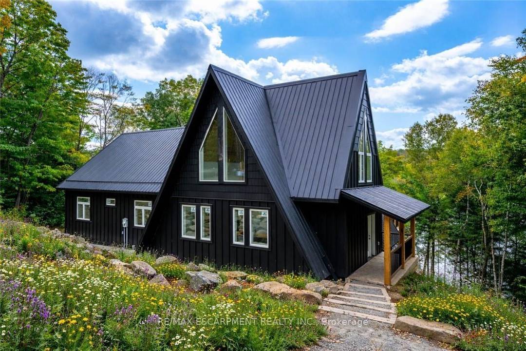 Exceptional opportunity to own this newly completed amp ; distinguished 3 bed, 2 bath A frame plus contemporary addition, commanding 120 ft of spring fed Wenona Lake shoreline where refined ...