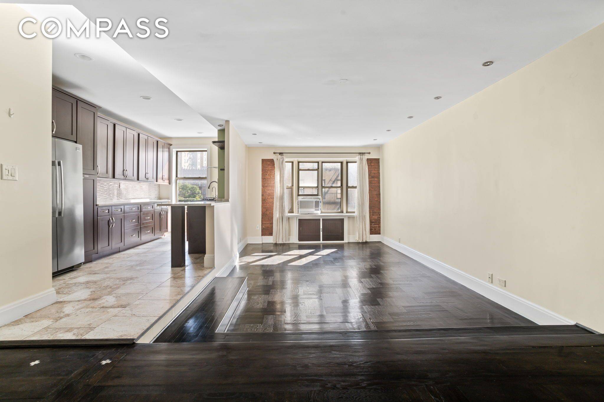 Step inside this rare true two bedroom, two bathroom corner apartment at The Bennett Arms in the heart of Hudson Heights.