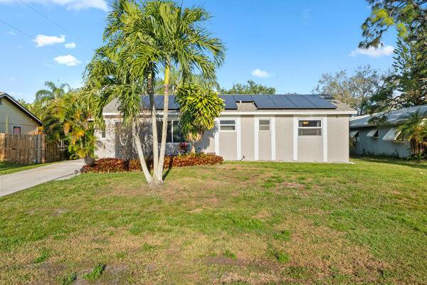 Spectacular updated and well maintained 3 2 CBS home features exquisite gourmet kitchen with quartz counters, Newer roof, Newer AC, impact windows through most of the house and solar panels.