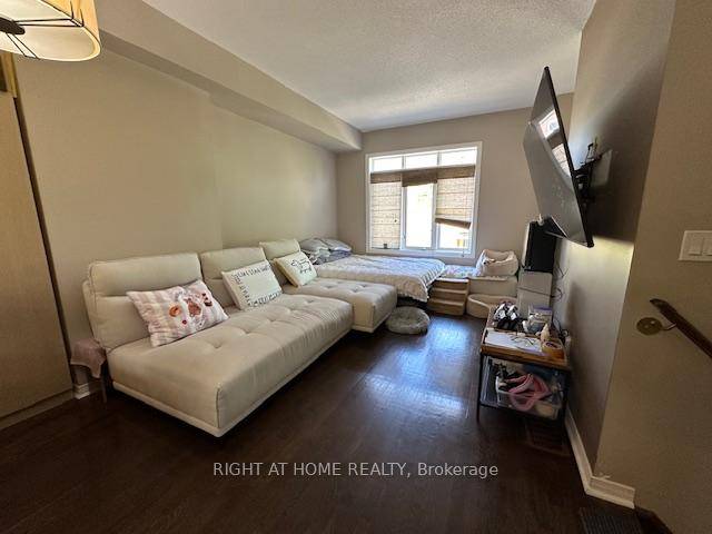 Located in the prestigious community of Applewood, The Orchard', this beautifully cared for executive townhouse offers a refined blend of style and functionality.