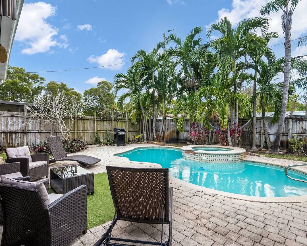 Experience the Florida lifestyle in this beautiful 3 bedroom, 2 bath pool home in this highly sought after Hollywood neighborhood.