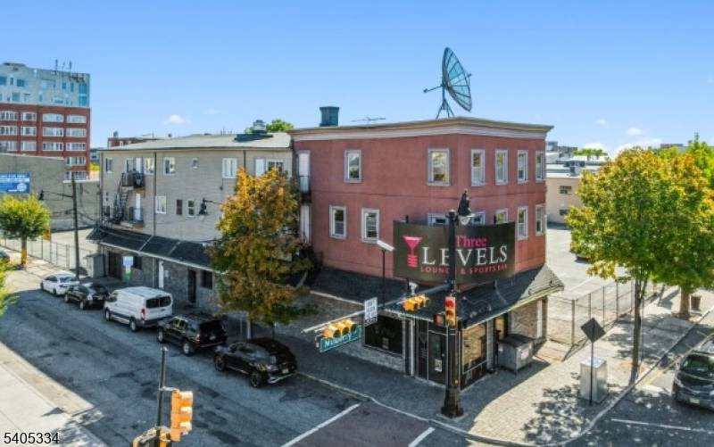 A rare opportunity to acquire a fully income producing mixed use property in the heart of Downtown Newark's Arena District, steps from the Prudential Center and Mulberry Commons Park.