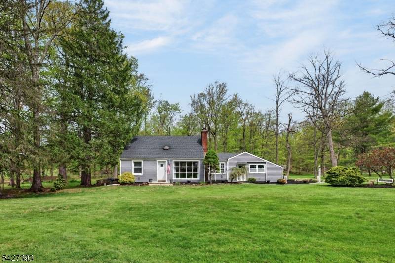 Unsurpassed setting ! Set on over 2 private, park like acres in desirable Martinsville, this beautifully maintained home offers the perfect blend of space, updates, and natural surroundings.