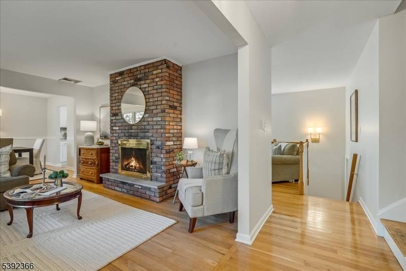 Welcome Home ! This beautiful 4 bedroom split level is nestled in the desirable Flanders section of Mt.
