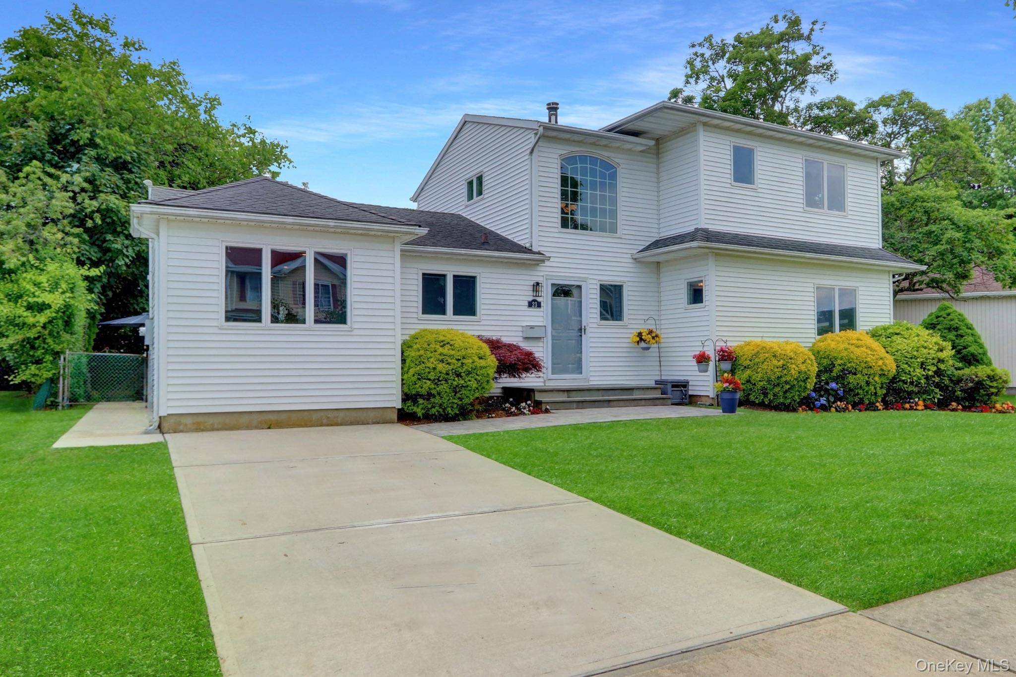 Meticulously maintained and thoughtfully expanded, this 4 bedroom, 3 bath Colonial style home offers a welcoming layout and excellent curb appeal.