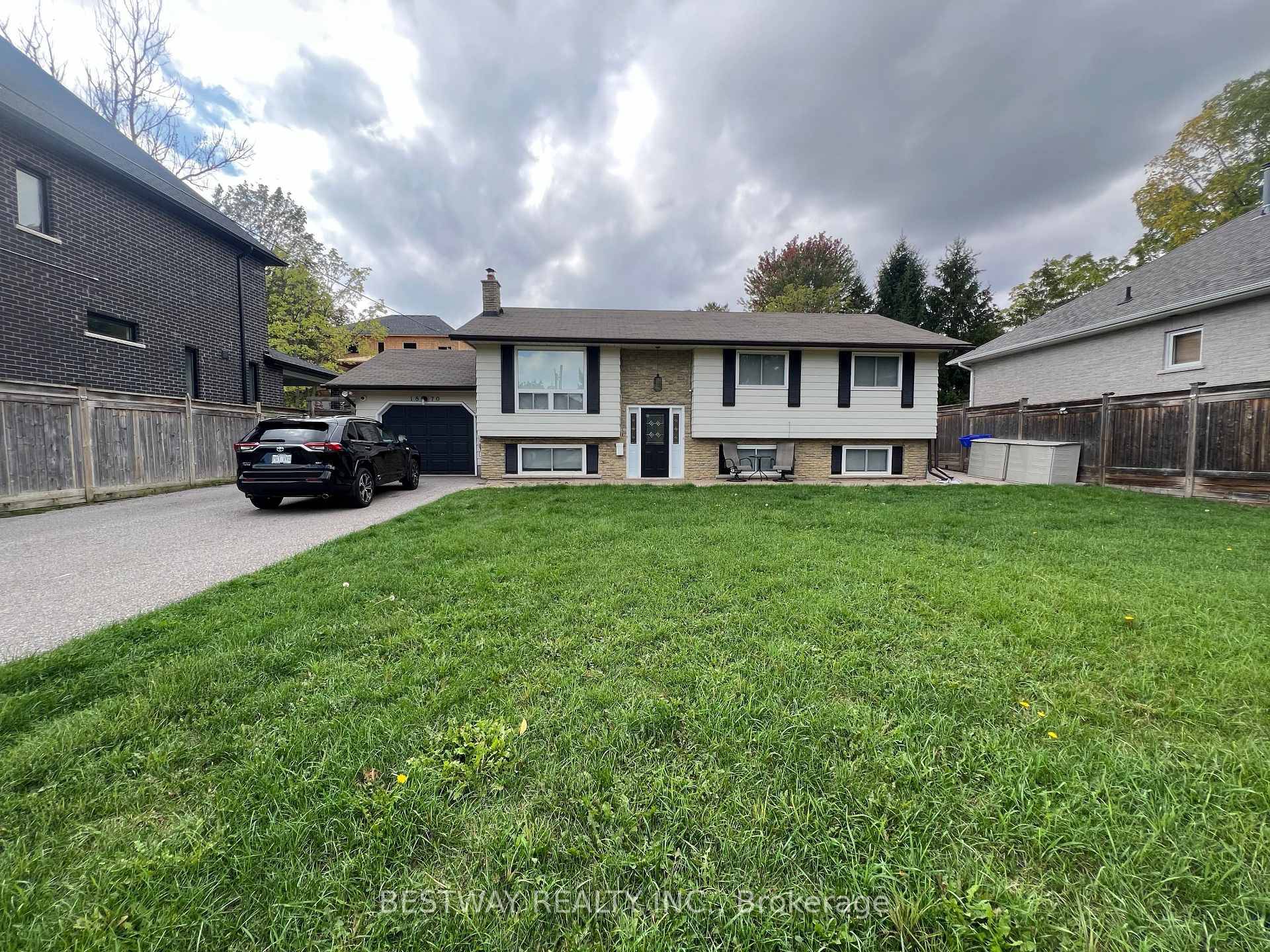 Renovated and modern bungalow, open concept with brand new vinyl flooring, stone kitchen counters, 3 spacious bedrooms, full bathroom with tub, new flooring in bathroom, Incredible driveway with room for ...