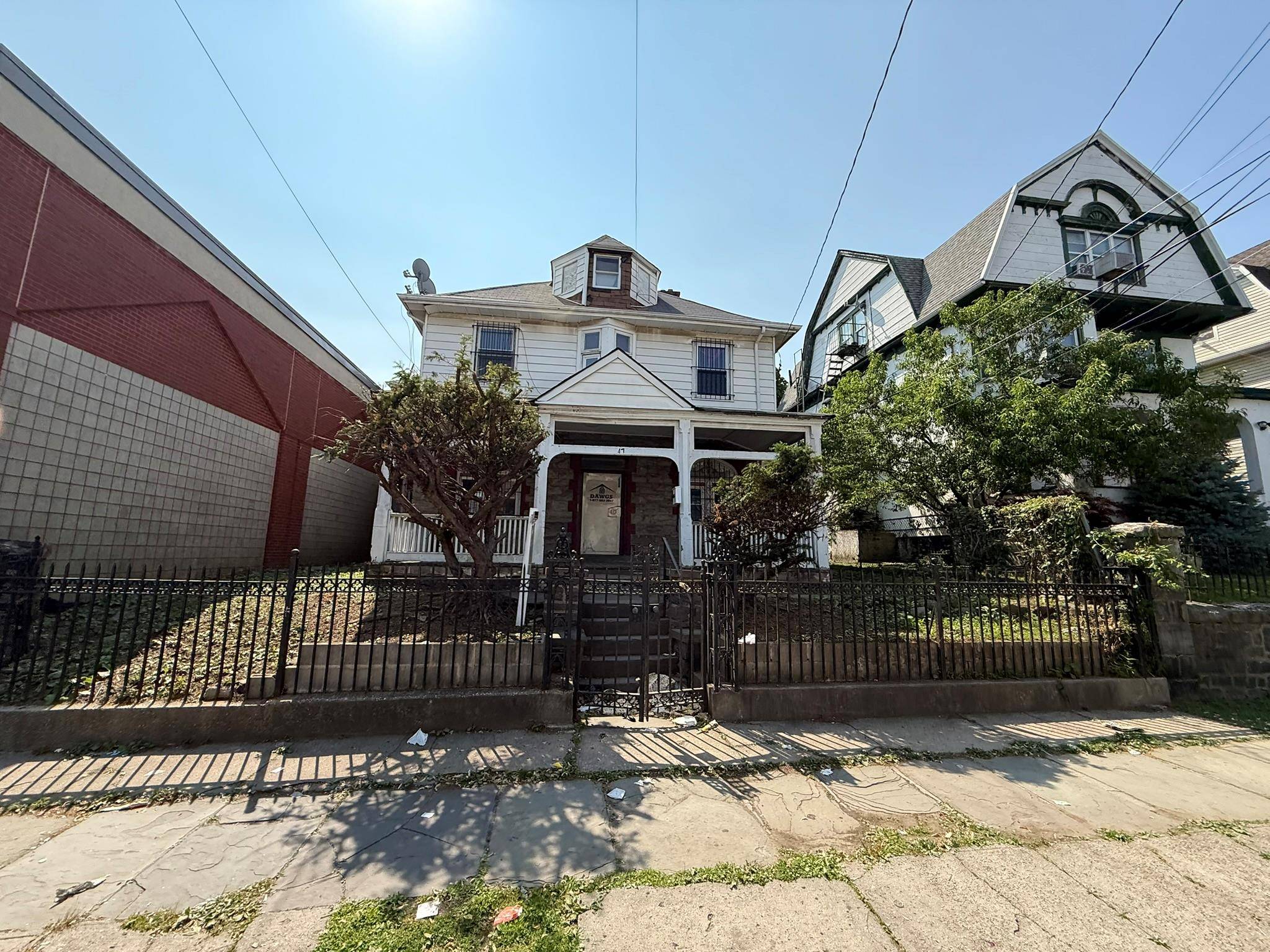 Nestled in the heart of vibrant downtown Yonkers, this commanding white Colonial offers a rare opportunity to own a piece of vintage charm with endless potential.
