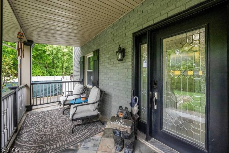 Fully renovated two family property offering over 3, 100 sq ft of beautiful living space.