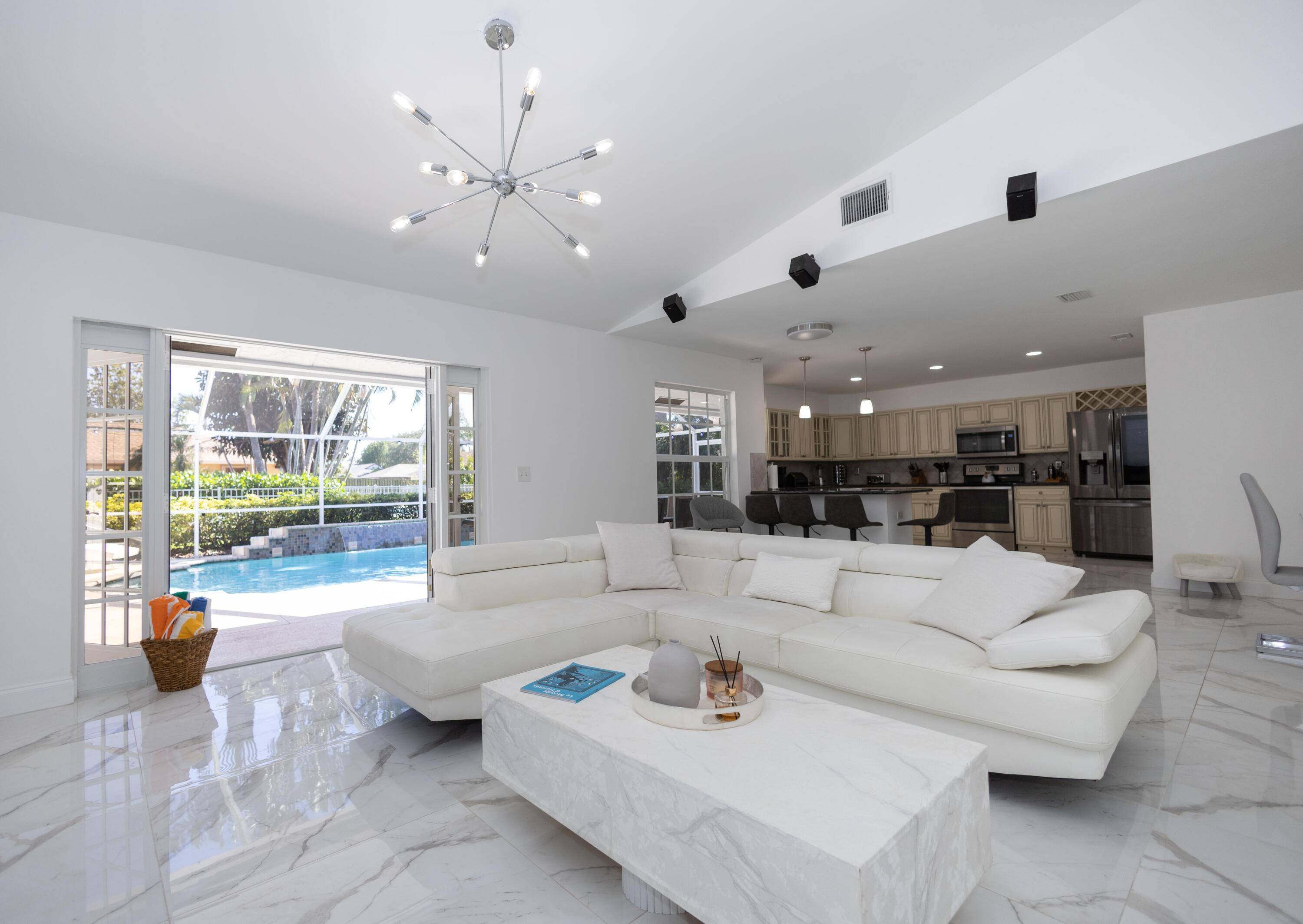This luxurious Four bedrooms villa is fully furnished and offers a private pool, an heated spa, and a beautifully manicured backyard.
