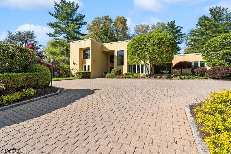 A rare opportunity to own a distinctive Livingston luxury home w architectural presence, resort style grounds, exceptional entertaining spaces that make everyday living feel special.