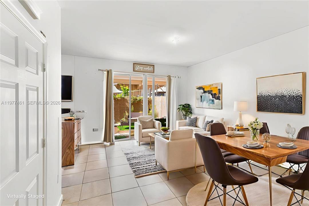 Stunning corner unit townhouse located in the desirable Tuscany Villages of Kendall.