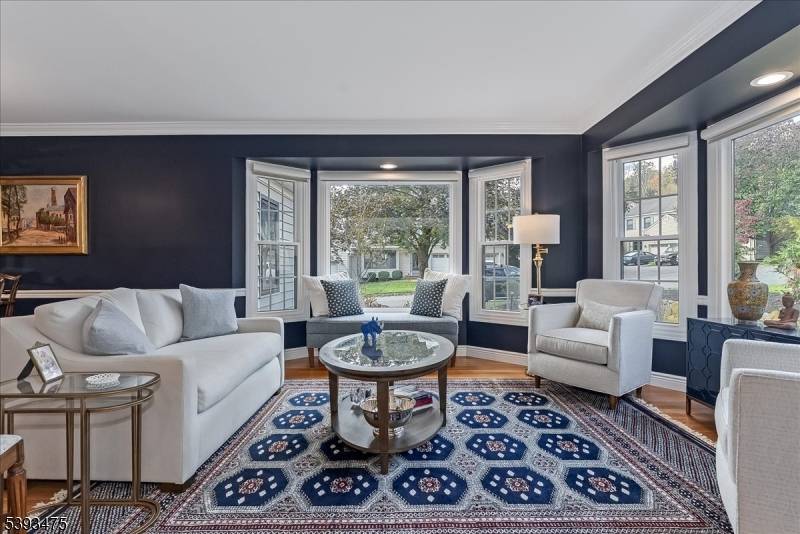 Welcome to this stunning 2 bedroom, 2 full bath ranch style condo with a 2 car garage in the highly sought after community of Harding Township, N.