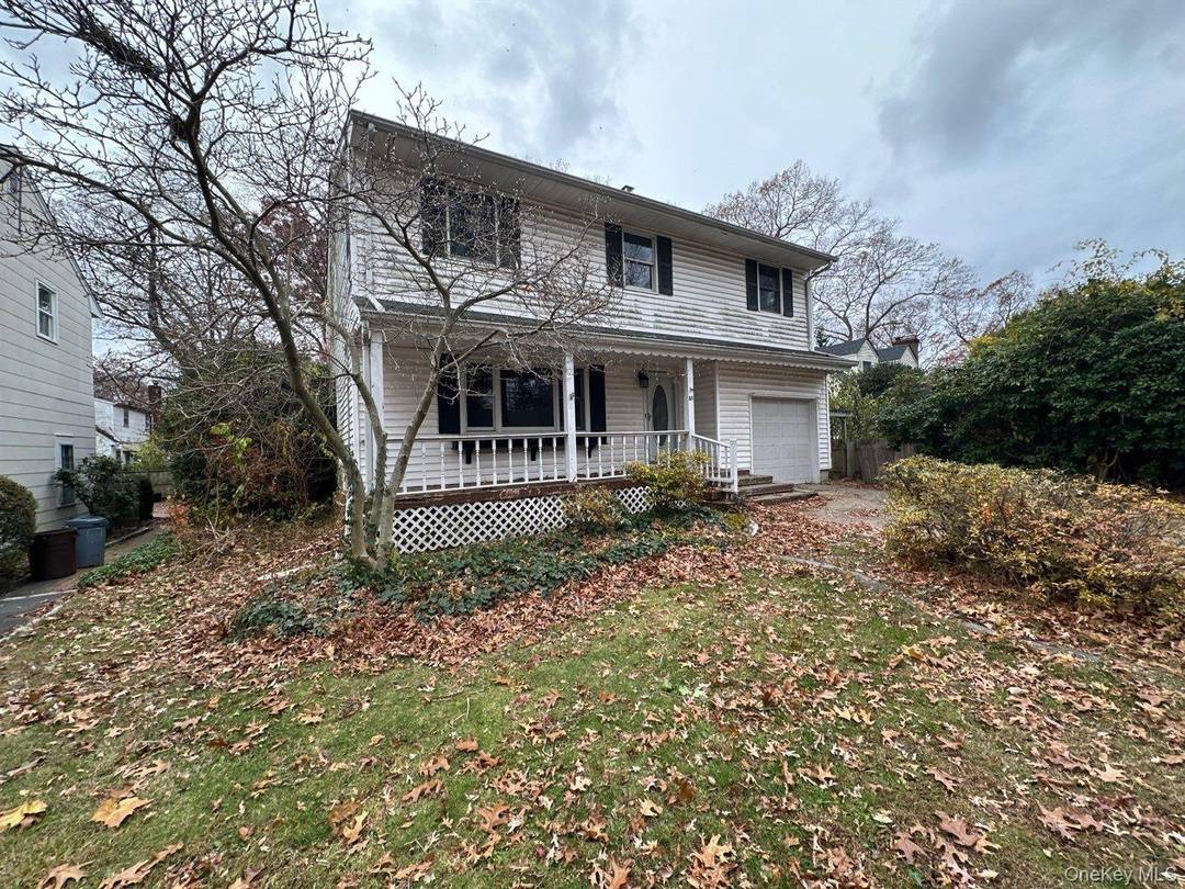 Colonial style home. This home features five bedrooms, 1.