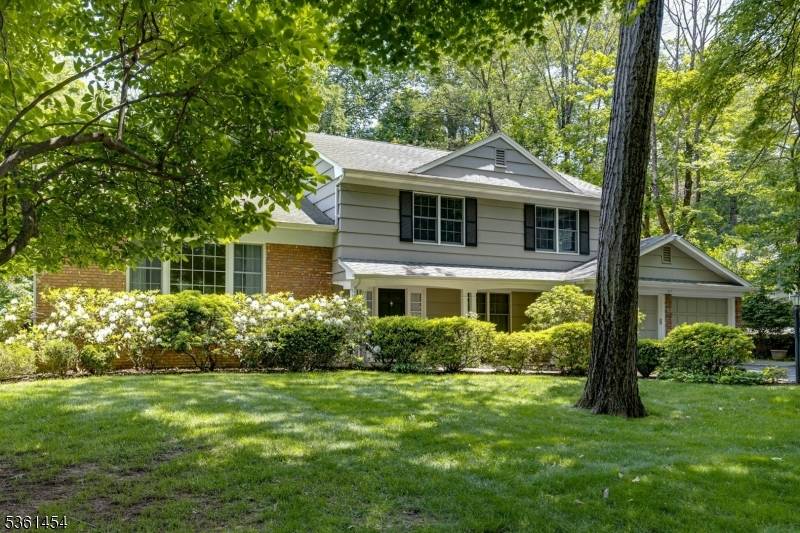 Move right into this well maintained Custom Colonial Split Level home !