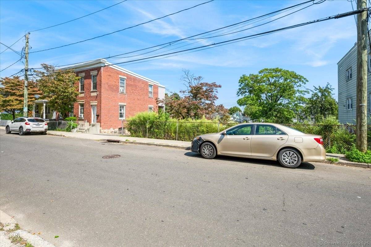 Opportunity Knocks ! Well maintained Brick 2 family home with a detached 2 car garage.