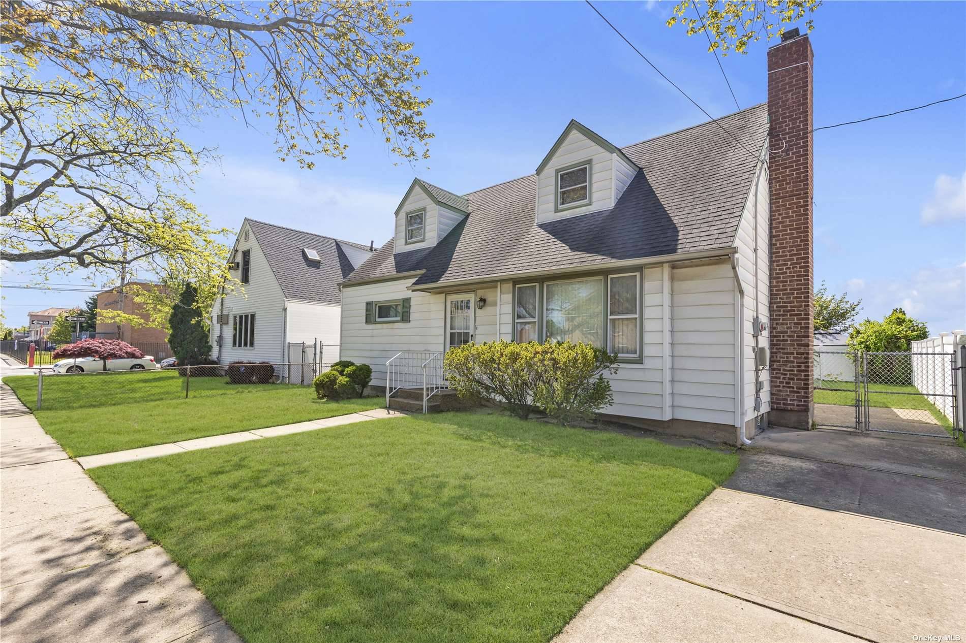 Spectacular expanded Cape with 6 bedrooms, 2 full bathrooms and plenty of living space.