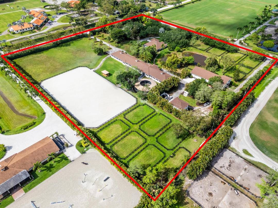 Enjoy the best of both worlds on this exceptional 10 acre equestrian property, ideally located just minutes from Global and WEF while offering the tranquility of Wellington's farm life.