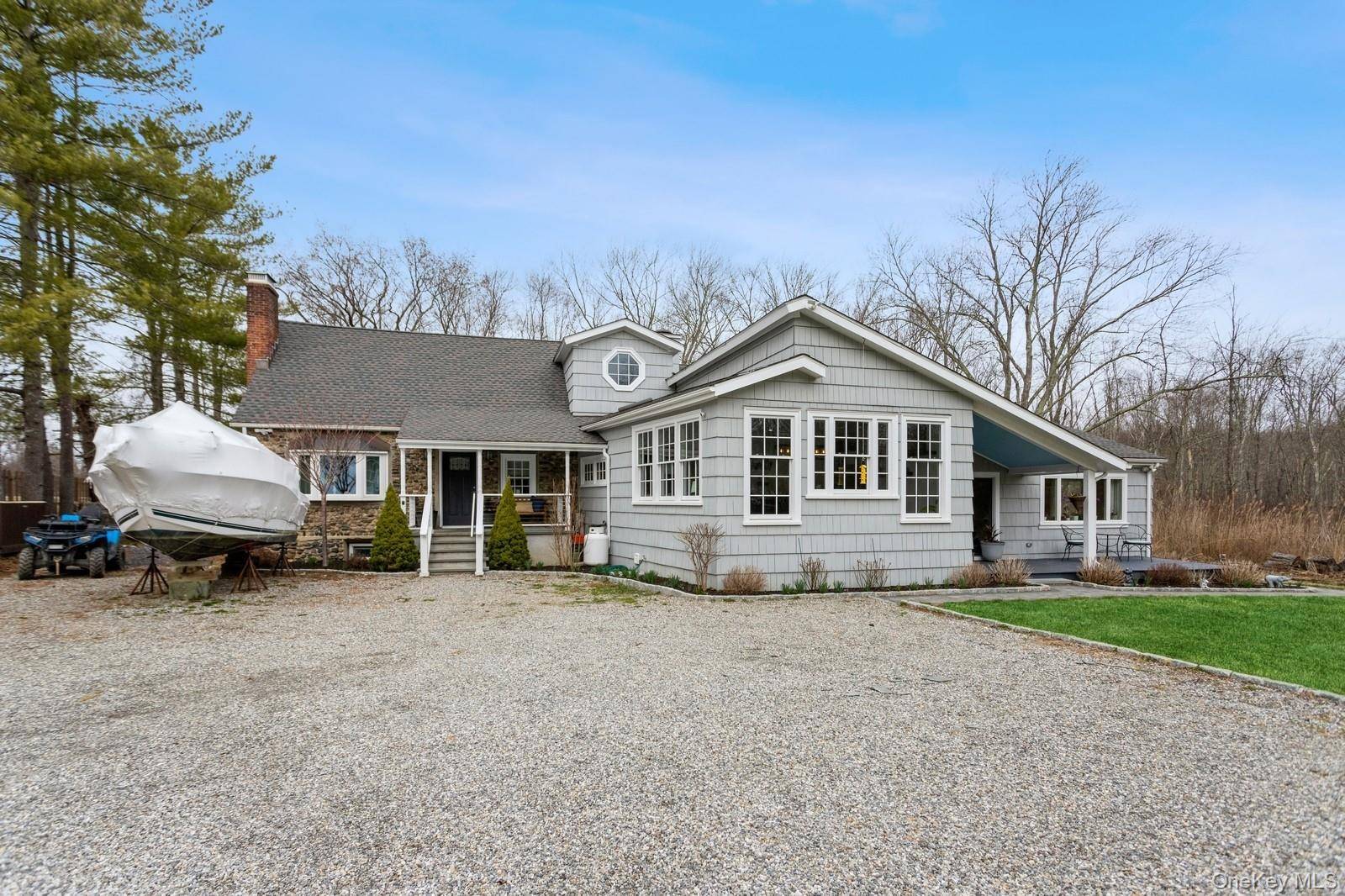 A Timeless Retreat with Modern Luxury in Lewisboro Tucked away on 5.