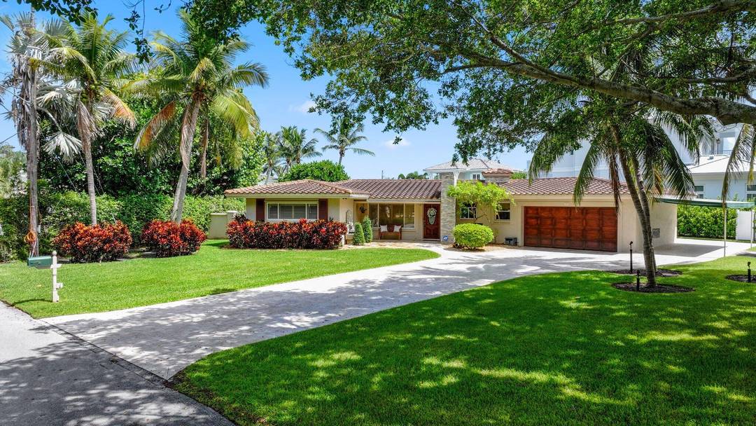 Introducing 910 Banyan Drive, a beautifully maintained waterfront ranch style estate located in the highly sought after Tropic Isle community of Delray Beach.