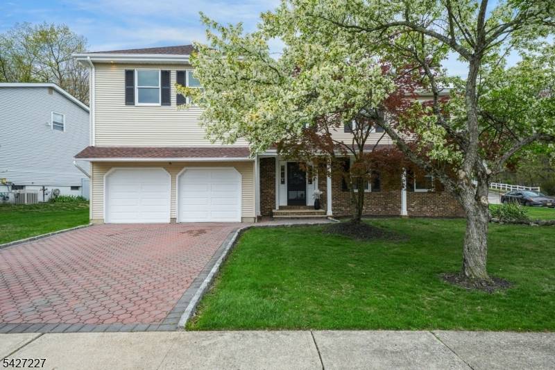 Welcome to this sprawling 5 bedroom, 3.