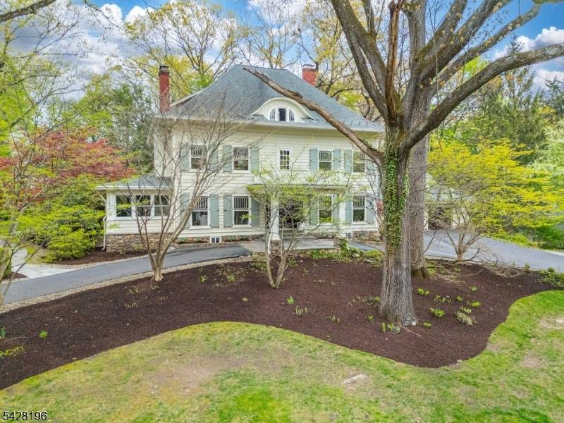 One of Mountain Lakes' most sought after and recognizable homes, this landmark, turnkey property blends presence, history, and modern comfort.