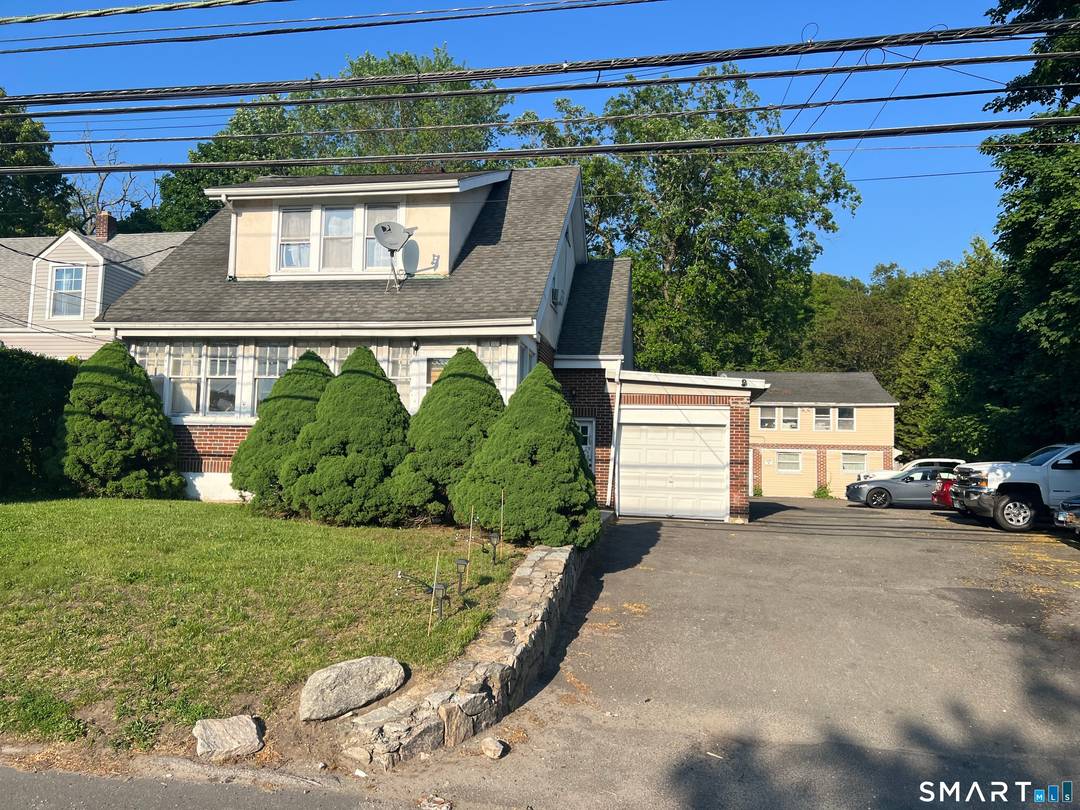 Investment Opportunity ! 275 Long Ridge Road is a legal 4 family, non conforming property w separate structures in the Bulls Head section of Stamford.