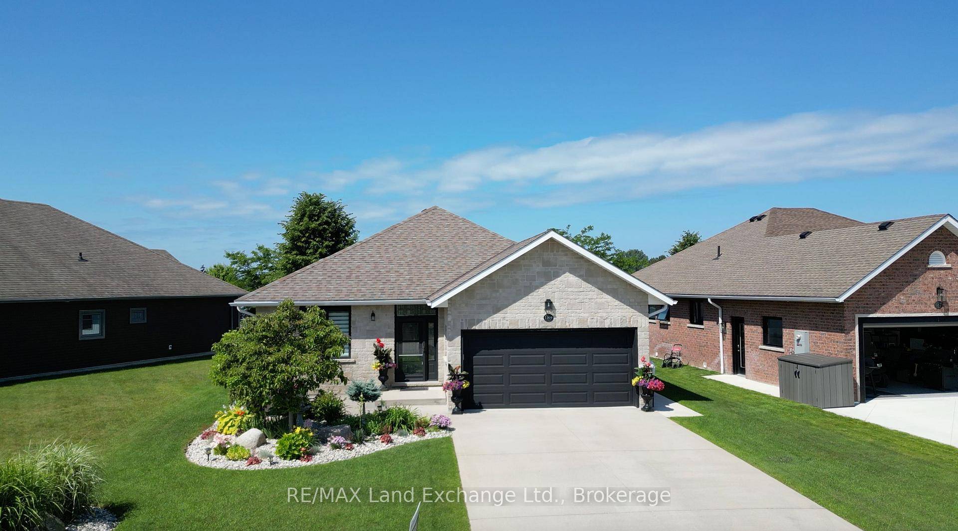 This completely updated and renovated 3 bedroom, 2 bath lakefront bungalow with a bright open and cheerful setting is truly a move in ready home !