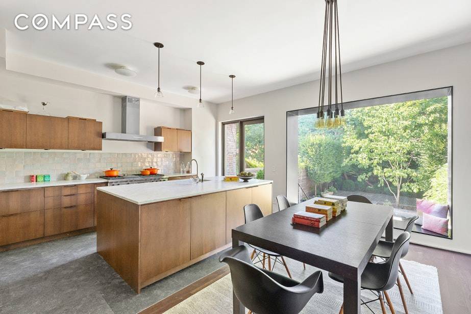 One of the most special townhouses in Brooklyn, this serene and elegantly dramatic home combines award winning design with historic detail and texture.