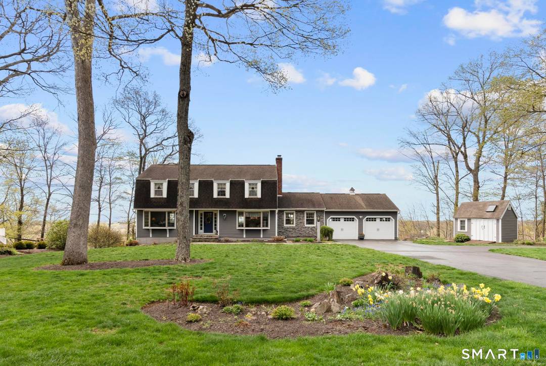 From this stunning Gambrel Colonial perched above Branford, the views sweep out over the tree tops and roll all the way to Long Island Sound and you'll catch them from ...