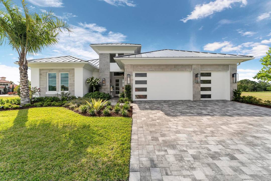 Tesoro Club, one of Florida's most prestigious private golf communities, sets the stage for refined luxury in this exceptional Ecclestone Signature model home.
