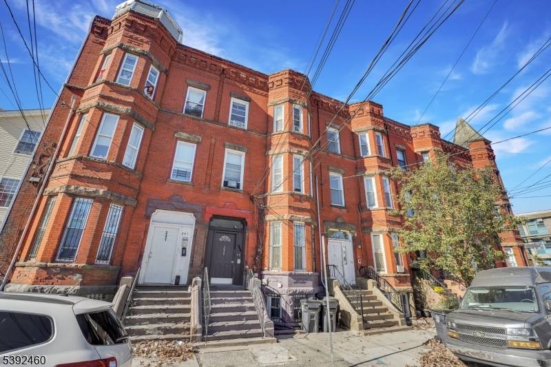 Investor's Dream ! Rare opportunity to own a fully occupied 3 unit brick triplex generating steady cash flow from day one.