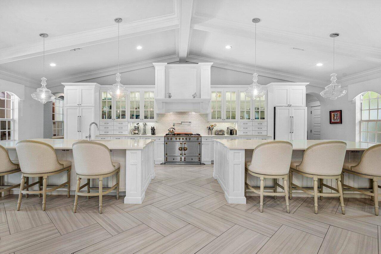 Situated on over one acre of land, this renovated and charming one story home offers you phenomenal views with nearly 190 feet on the largest lake in Steeplechase !