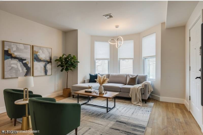 This exceptional two family home in the vibrant community of Union City offers a generous backyard and limitless potential.