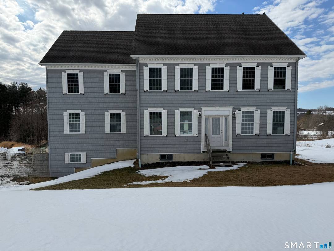 This beautiful Colonial offers an incredible amount of space, featuring over 3, 600 square feet of finished living space and a highly sought after five car garage setup.