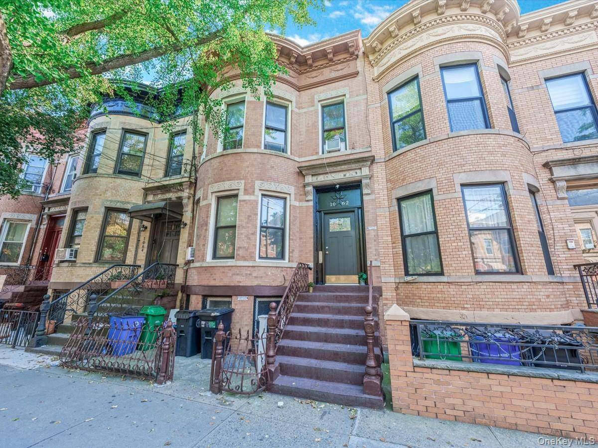 Welcome to 1062 Seneca Ave, a spacious and well maintained attached brick three family townhouse in the heart of Ridgewood, Queens.