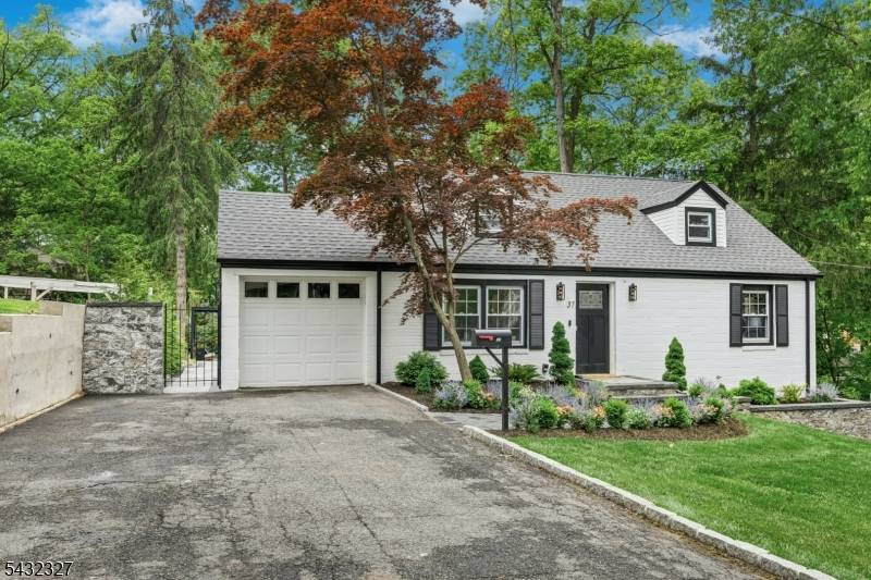 Located on a quiet street near Redwood Elementary, Eagle Rock Reservation, and the newly redeveloped West Orange Plaza, this beautifully updated 4 bed, 2.