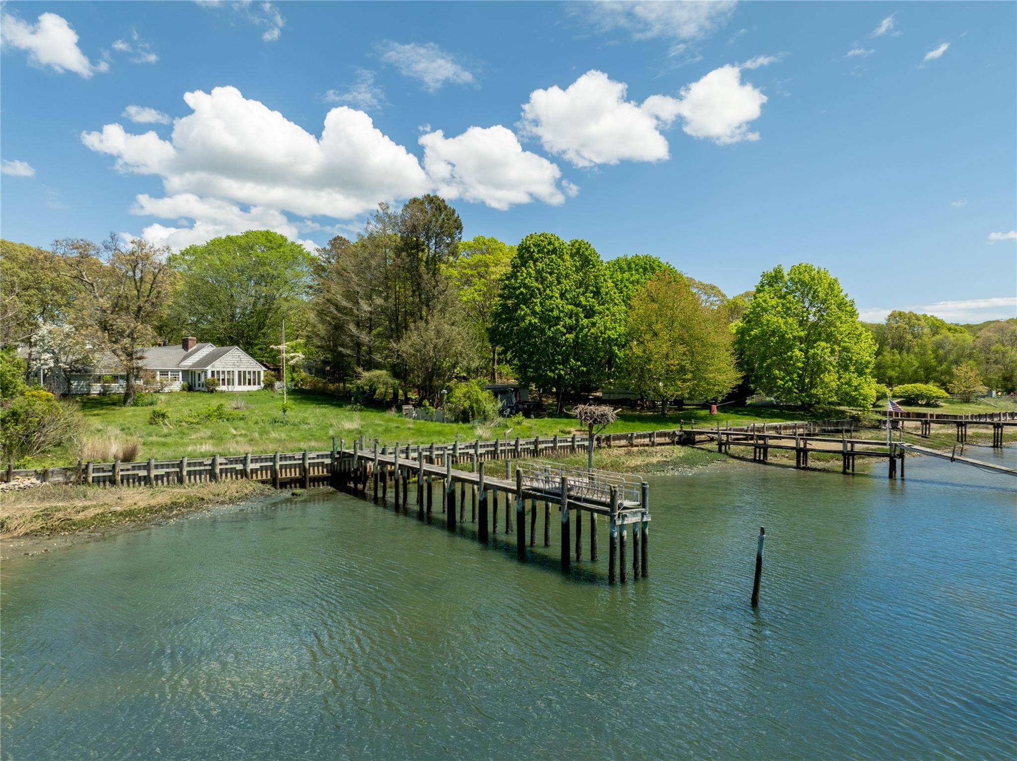 Deep water dock on East side of Mattituck Inlet.