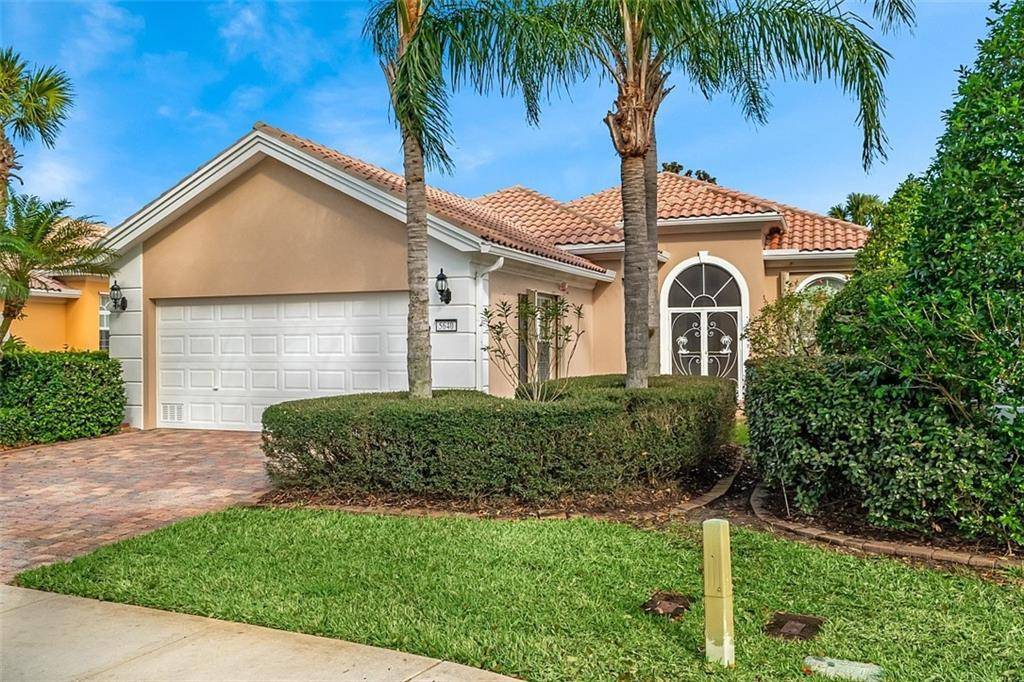 Relax and Enjoy this charming Oakmont Model Home 3BD 3BA w Den overlooking the lake !