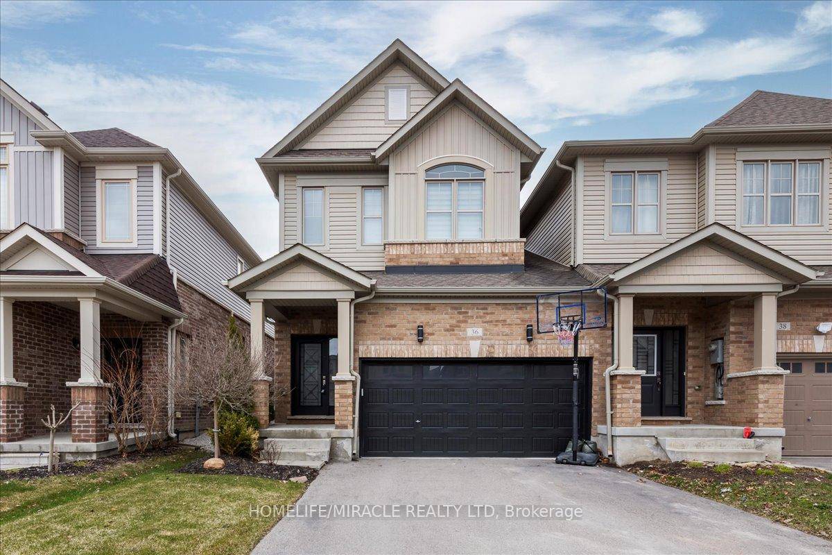 Welcome to 36 Hoard Ave N, A Spacious End Unit Townhome That Feels Like a Detached !
