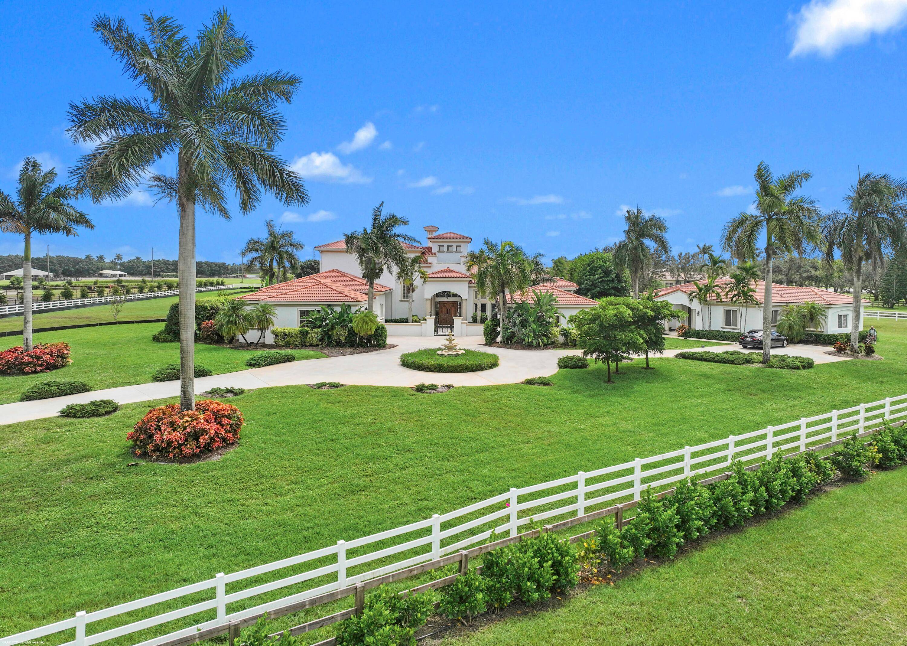 Stunning estate home with guest house situated on 6.
