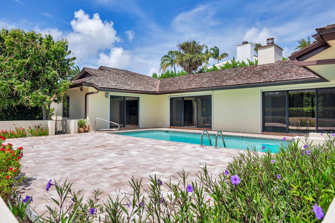 Minutes to ocean beaches, the Lake Trail, and the heart of Palm Beach, this 3 bedroom, 4.