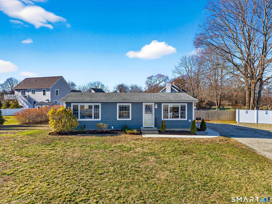 Saybrook Point ! This fully renovated coastal retreat with partial water views offers an exceptional blend of privacy, charm and effortless lifestyle.